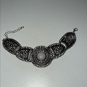 Elegant Silver Bracelet with Intricate Design